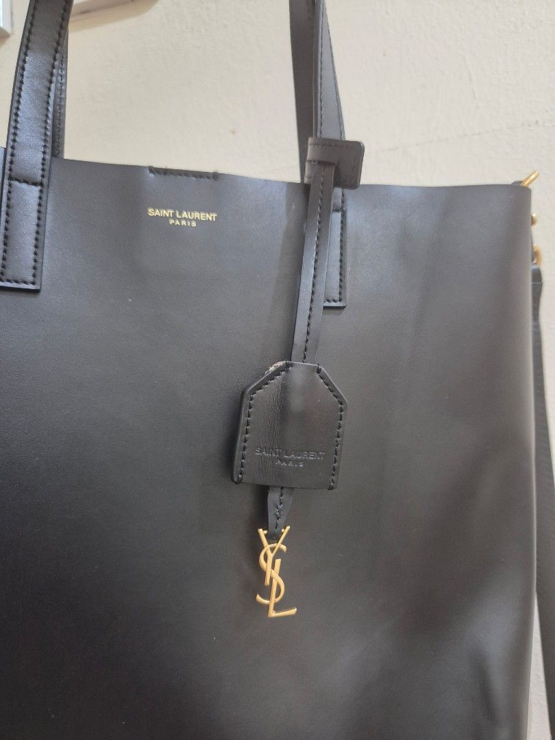 YSL Toy Shopping N/S (Category: Luxury Bags & Wallets) located in Pasig City. Submitted by 53888 (Listing ID 1396247443, Image 3). Description: authentic YSL leather tote coded no inclusion measurement: 9.8 x 11 x 3.1 inches.