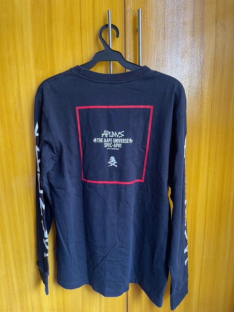 AAPE by A Bathing Ape Long Sleeve Shirt (Category: Tshirts & Polo Shirts ) located in Mandaluyong City. Submitted by justfits_ (Listing ID 1401328995, Image 2). Description: - AAPE by A Bathing Ape long sleeve shirt - Size: M - Features a unique skull design with lightning bolt - Good condition - Streetwear style.
