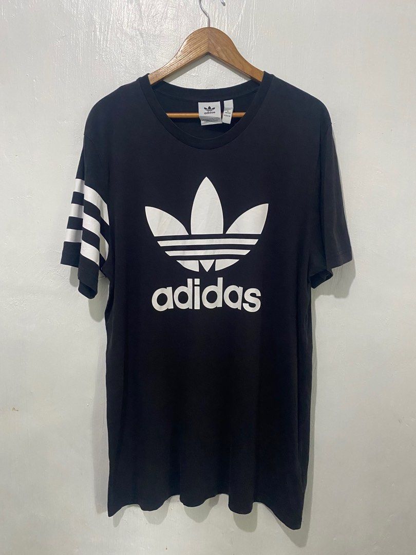 Adidas Trefoil Tee XL Black (Category: Tshirts & Polo Shirts ) located in Sorsogon. Submitted by ninjathrift (Listing ID 1401179011, Image 1). Description: Like New Condition 24 width, 33 lenght 9/10 Color Rate No issue.