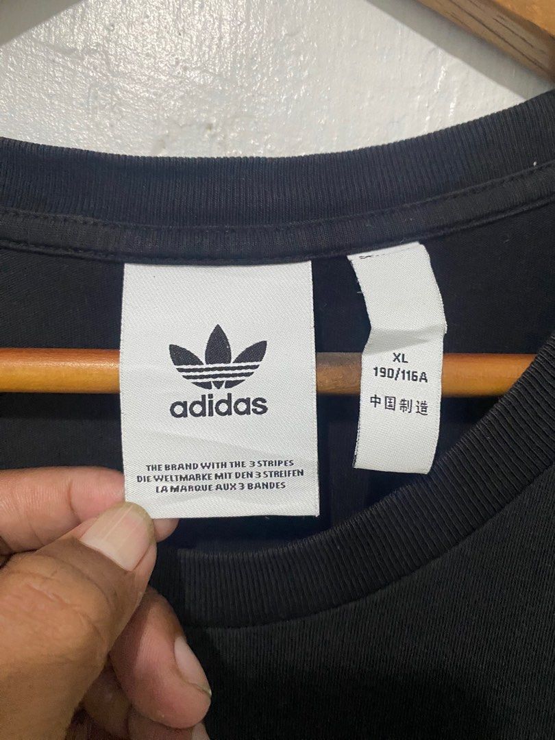Adidas Trefoil Tee XL Black (Category: Tshirts & Polo Shirts ) located in Sorsogon. Submitted by ninjathrift (Listing ID 1401179011, Image 3). Description: Like New Condition 24 width, 33 lenght 9/10 Color Rate No issue.