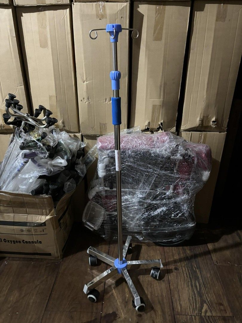 Adjustable IV Stand with Wheels (Category: Medical Supplies & Tools) located in Manila. Submitted by medicalcare12 (Listing ID 1401176382, Image 1). Description: IV stand features a height-adjustable pole with a blue adjustment mechanism. It has a sturdy, wheeled base for easy mobility. The stand is made of stainless steel and has a blue top. It is designed to hold IV bags securely. Perfect for medical use or home healthcare. 09648962009 brandnew