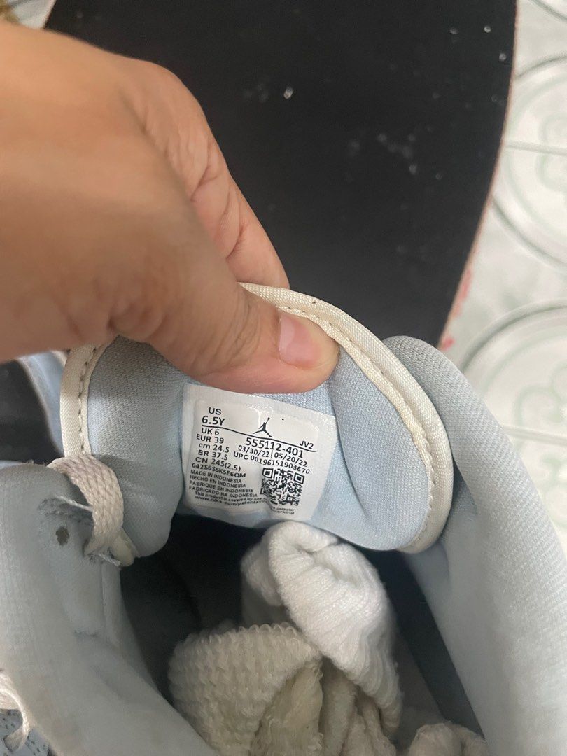Air Jordan 1 Mid Light Blue Black (Category: Sneakers) located in Pasig City. Submitted by kyla792980 (Listing ID 1401219575, Image 1). Description: Air Jordan 1 Mid in a light blue, black, and white colorway. Features the iconic Air Jordan wings logo on the side. The size is US 6.5Y. The shoes have white laces and a light blue and black design. The sole is white. kasya po sa 7.5 wms size.. declutter:) nabili ko sya sa footlcker sg.