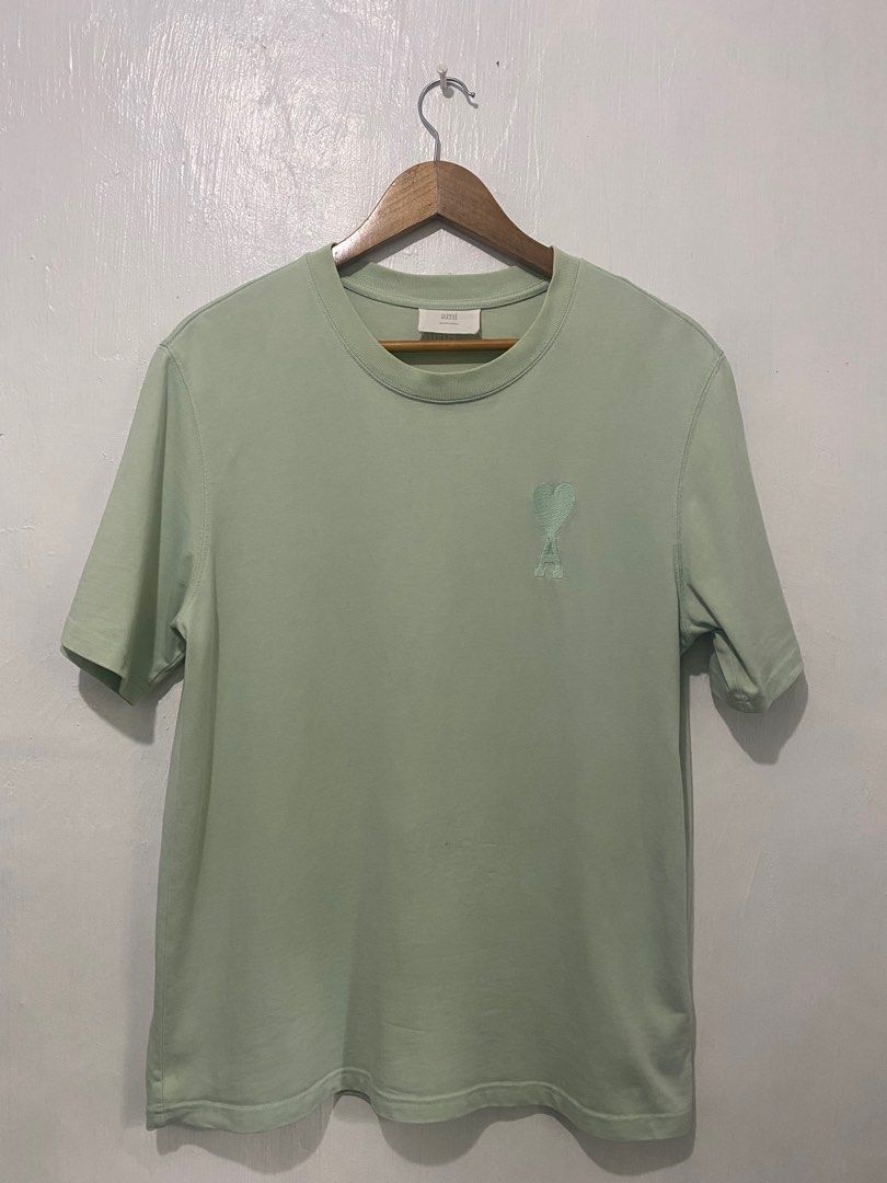 AMI Paris Green T-shirt (Category: Tshirts & Polo Shirts ) located in Sorsogon. Submitted by ninjathrift (Listing ID 1401180070, Image 1). Description: Like New Condition 20 width, 27 lenght 9.5/10 Color Rate Issue: very Small dirt shown on last photo (not sure if washable).
