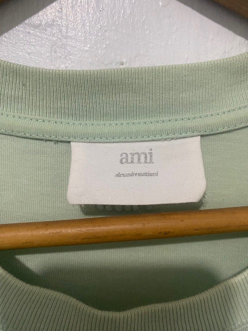 AMI Paris Green T-shirt (Category: Tshirts & Polo Shirts ) located in Sorsogon. Submitted by ninjathrift (Listing ID 1401180070, Image 3). Description: Like New Condition 20 width, 27 lenght 9.5/10 Color Rate Issue: very Small dirt shown on last photo (not sure if washable).