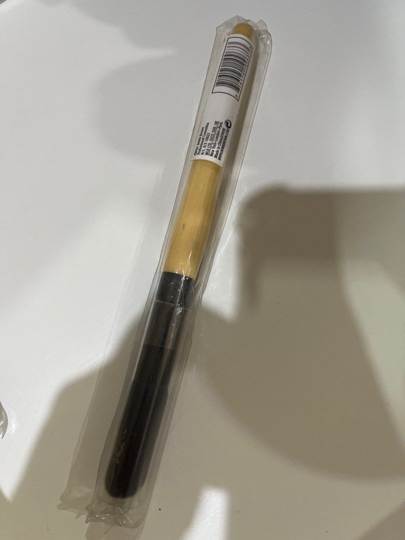 Bobbi Brown Sheer Powder Brush (Category: Makeup) located in Manila. Submitted by marylouche42170 (Listing ID 1401167420, Image 2). Description: Authentic Bobbi Brown Sheer Powder Brush. It is still in its original packaging. The brush has a black handle and a light-colored wooden section. The price tag shows a price of 3,300.00. The brush is designed for applying sheer powder..