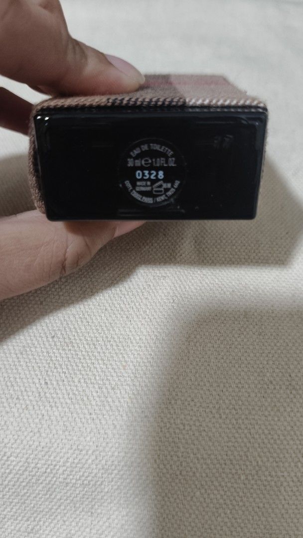 Burberry Classic Eau de Toilette 30ml (Category: Fragrance & Deodorants) located in Mandaluyong City. Submitted by declutter_kween (Listing ID 1401313125, Image 2). Description: - Burberry Classic Eau de Toilette - 30ml bottle - Classic Burberry plaid design - Rectangular bottle - Black cap - Batch code: 0328.