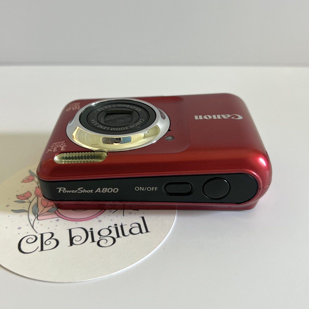 Canon Powershot A800 RED Digital Camera Digicam (Category: Cameras) located in Lipa City. Submitted by cbdigital (Listing ID 1401183858, Image 3). Description: Interested buyers, please message me at my ig:@cbdigitalph [USED] Canon Powershot A800 10 MP 3.3x Optical Zoom INCLUSIONS: Unit Battery Charger 2GB Memory Card Wrist Strap Camera Case ✅✅ LENS ZOOM, FLASH, ALL BUTTONS WORKING PRICE: ₱4,500 Message us for sample shots. OTHERS: [Common to use