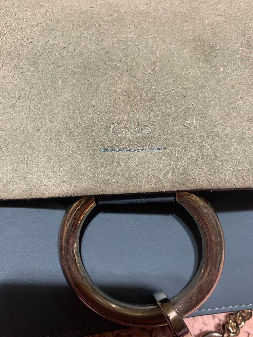 Chloe Faye Shoulder Bag (Category: Luxury Bags & Wallets) located in Bulacan. Submitted by love2loved (Listing ID 1401297168, Image 3). Description: - Color: Blue - Material: Suede flap and leather body - Straps: Chain strap and adjustable leather strap - Interior: Main compartment and small pocket - Details: Large metal ring detail - Made in Italy good condition signs of usage silver hardware small size 5 .5 inches length 9.5 inches width with c