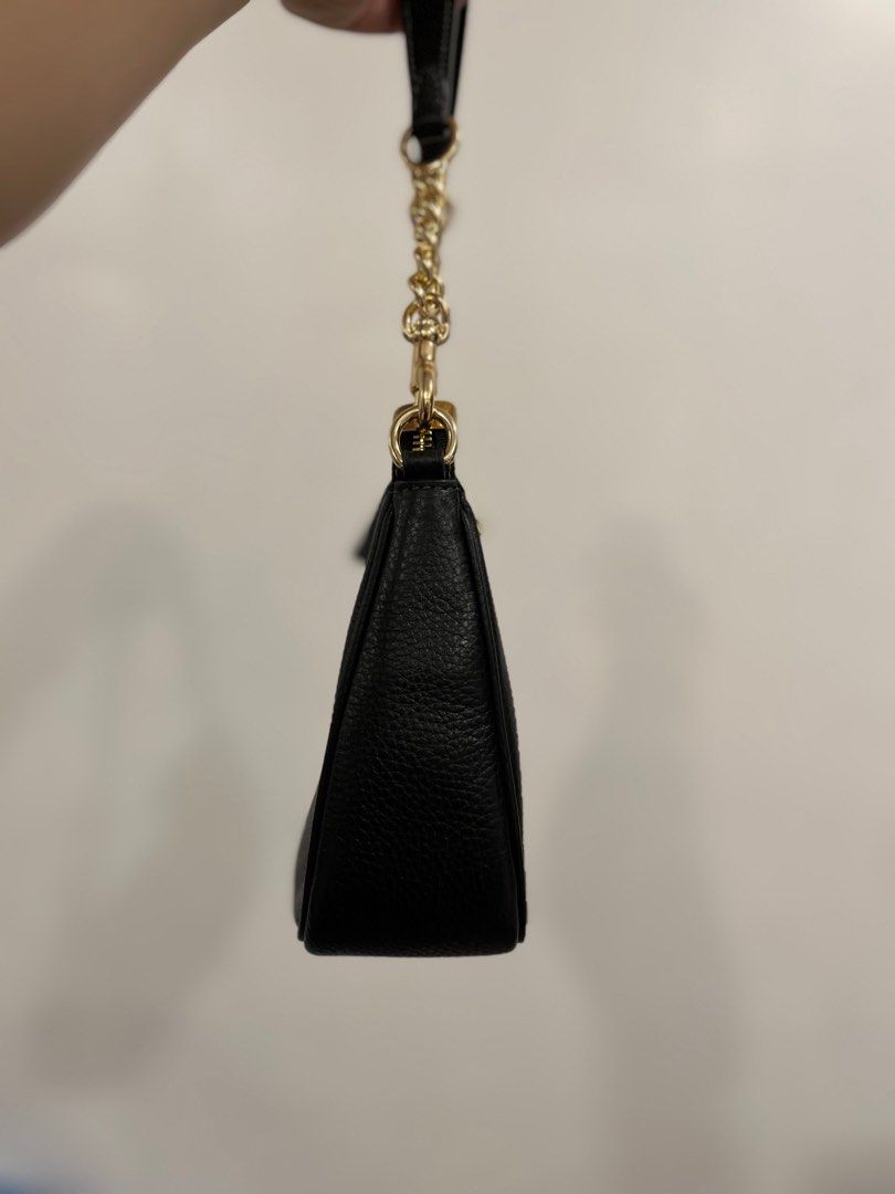 Coach teri (Category: Luxury Bags & Wallets) located in Manila. Submitted by luxwalletbags (Listing ID 1401286307, Image 3). Description: - Black Coach shoulder bag - Gold-tone chain strap - Zip closure - Small Coach logo - Rounded shape - Leather material - Detachable strap - Leather tag on zipper guaranteed original.