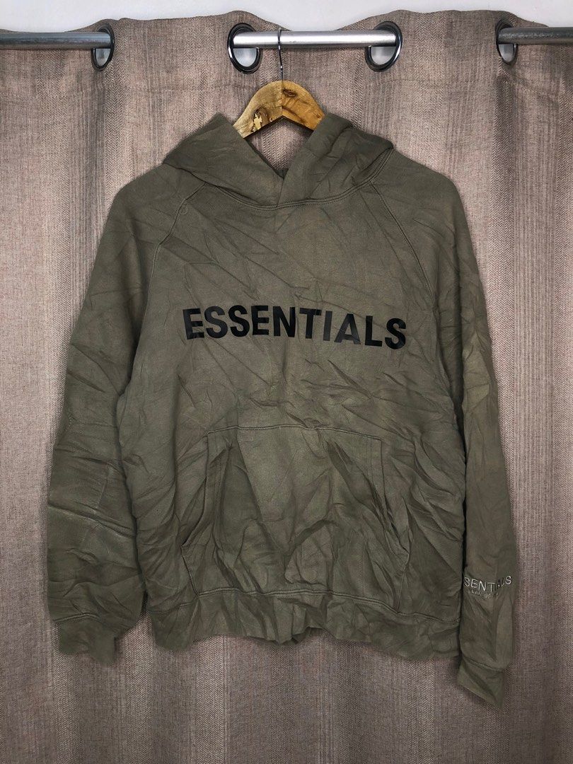 Fear of God Essentials Hoodie (Category: Hoodies) located in Quezon City. Submitted by yeahsource222 (Listing ID 1401322150, Image 1). Description: - Essentials hoodie - Muted green color - Black Essentials logo print - Features logo on front and sleeve - Kangaroo pocket - Drawstring hood.