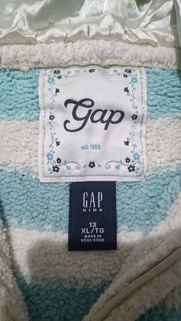 Gap Kids Fluffy Hoodie Jacket (Category: Babies & Kids Fashion) located in Taguig. Submitted by schdxt (Listing ID 1401169712, Image 2). Description: Gap Kids Fleece Hoodie Jacke, size 12/XL/TG in kids. Can also fit size XS~M in adult women's clothing Well used, but in good condition. MOP: Gcash/Paymaya MOS: Gogoexpress/Lalamove.