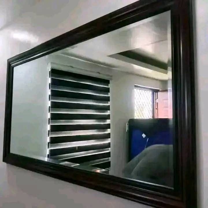 Large Rectangular Wall Mirror (Category: Mirrors) located in Mabalacat. Submitted by arlenemamangun01 (Listing ID 1401208356, Image 1). Description: Large rectangular wall mirror with a dark wooden frame. The mirror is suitable for living rooms, bedrooms, or hallways. It is a good size for checking your outfit or adding a decorative touch to your space. The mirror is 29x52 inches..