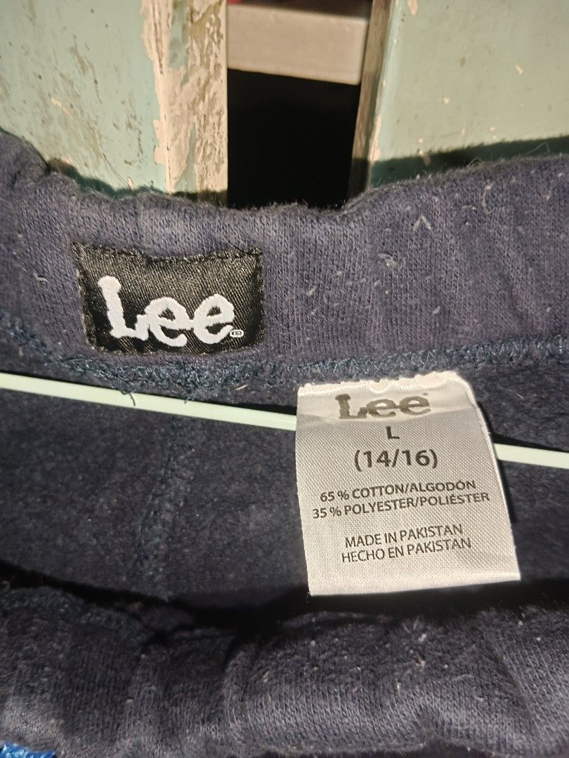 Lee Sweatpants - Size L (Category: Joggers) located in San Juan City. Submitted by vrncrosetejk (Listing ID 1401226224, Image 2). Description: Dark blue Lee sweatpants. Features a drawstring waist and two front pockets. The size is L (14/16). Made of 65% cotton and 35% polyester. Made in Pakistan..