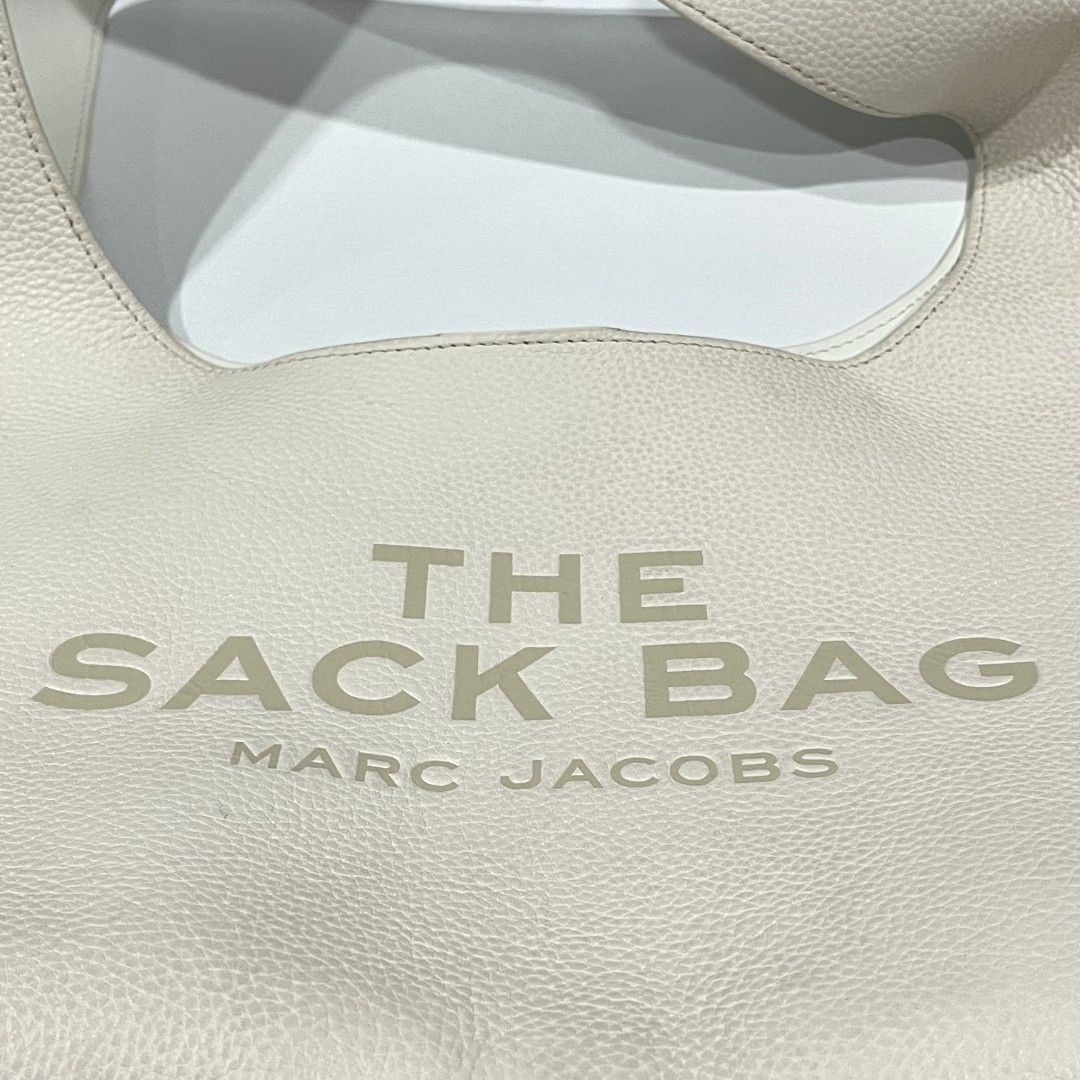 MARC JACOBS The Sack Bag (Category: Luxury Bags & Wallets) located in Quezon City. Submitted by pleasehelpmedeclutter (Listing ID 1401321453, Image 1). Description: • authentic • no inclusion • preloved (please manage your expectations) • open for meetup (faster and safer transaction).
