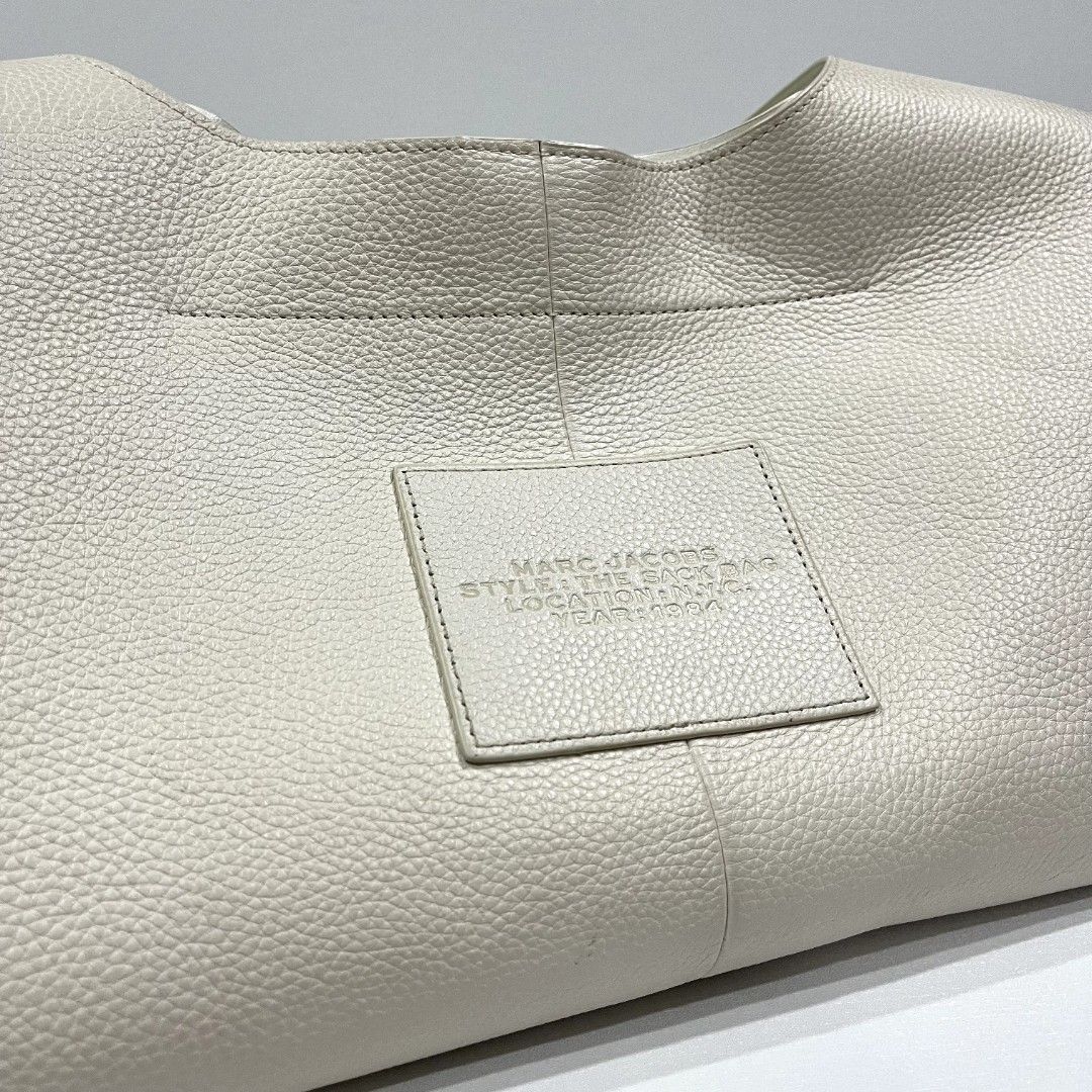 MARC JACOBS The Sack Bag (Category: Luxury Bags & Wallets) located in Quezon City. Submitted by pleasehelpmedeclutter (Listing ID 1401321453, Image 2). Description: • authentic • no inclusion • preloved (please manage your expectations) • open for meetup (faster and safer transaction).