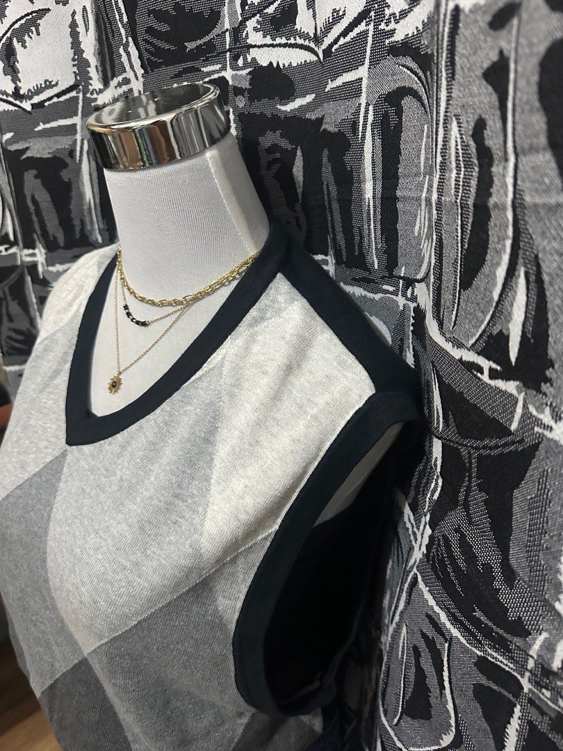 Merona Argyle Vest - Size L (Category: Vests) located in Antipolo. Submitted by declutteringsizzy (Listing ID 1401291160, Image 3). Description: - Merona argyle vest - Size: Large - Classic argyle pattern in gray - Features black trim - V-neck design - Comfortable fit - Perfect for layering - Width = 22.5in” - Length = 29in”.