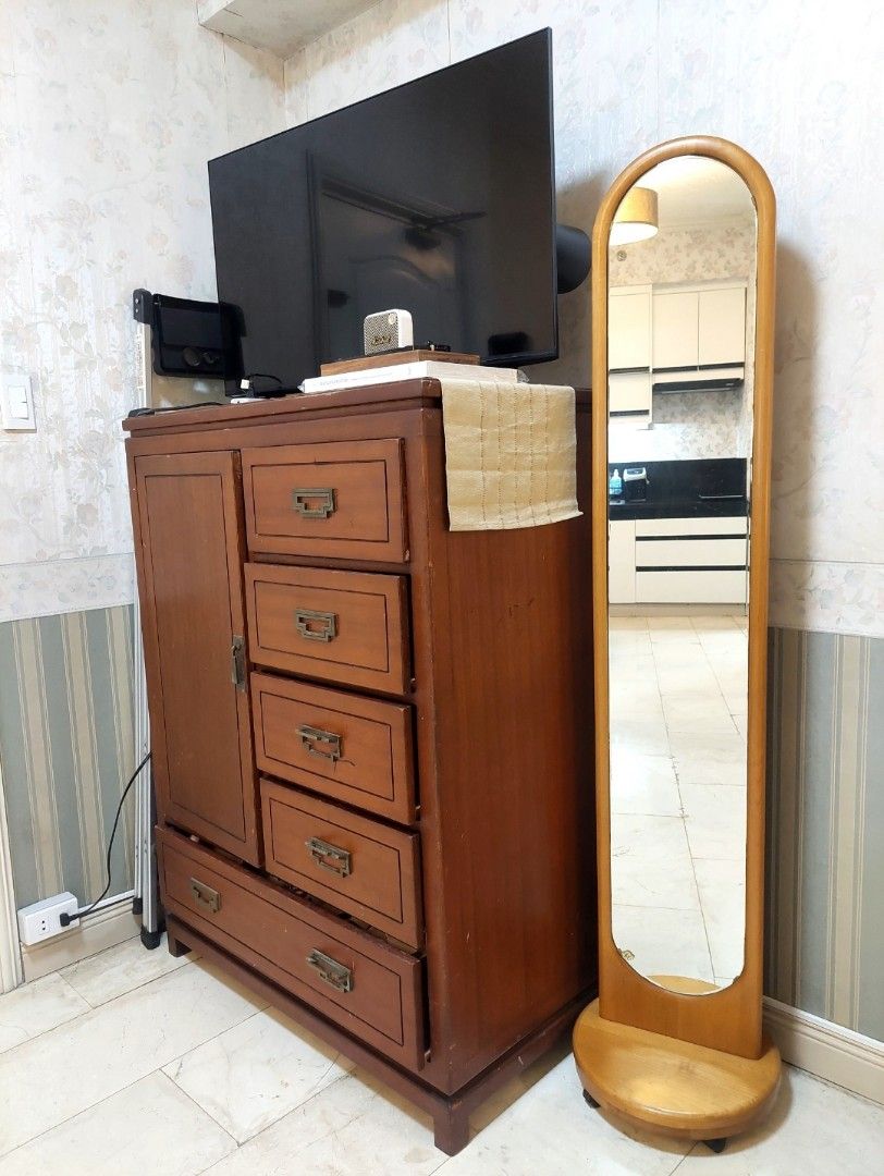 Mid Century Solid Narra Tall Dresser Cabinet (Category: Shelves, Cabinets & Racks) located in Quezon City. Submitted by every2nd_counts (Listing ID 1398047736, Image 2). Description: ⁃ FIXED PRICE (selling low) move-out sale ⁃Mid Century Gentleman's Chest ⁃ Solid Narra dark wood finish ⁃ Solid Brass hardware ⁃ Multiple drawers and a door compartment (in good working order) ⁃ Ample storage space ⁃ Sturdy construction ⁃Dimensions 100cm x 50cm x 130