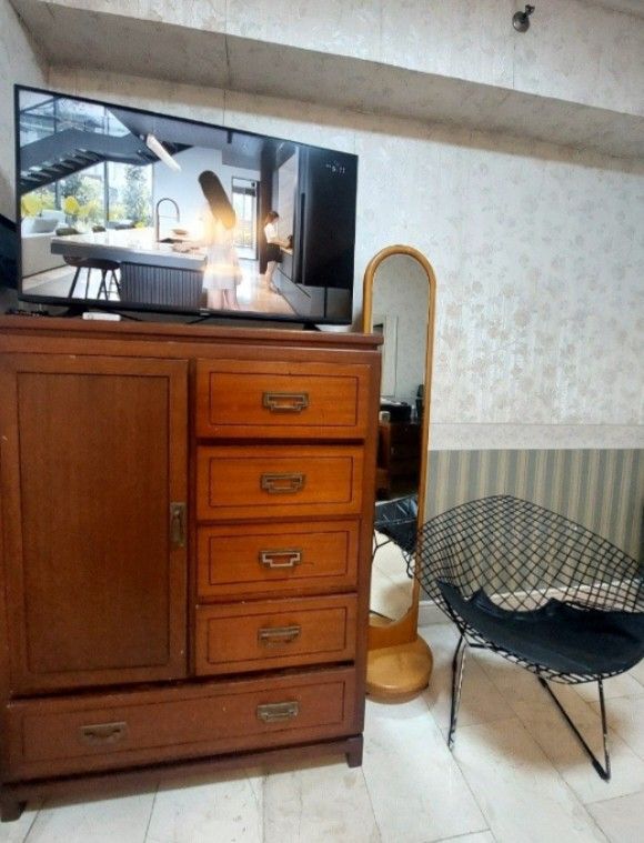 Mid Century Solid Narra Tall Dresser Cabinet (Category: Shelves, Cabinets & Racks) located in Quezon City. Submitted by every2nd_counts (Listing ID 1398047736, Image 3). Description: ⁃ FIXED PRICE (selling low) move-out sale ⁃Mid Century Gentleman's Chest ⁃ Solid Narra dark wood finish ⁃ Solid Brass hardware ⁃ Multiple drawers and a door compartment (in good working order) ⁃ Ample storage space ⁃ Sturdy construction ⁃Dimensions 100cm x 50cm x 130