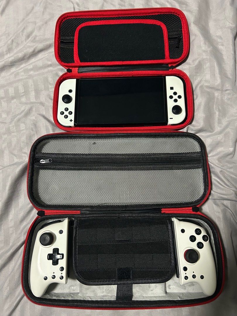 Nintendo Switch Oled (Category: Cases & Sleeves) located in San Pedro. Submitted by carrot_carrot (Listing ID 1401185463, Image 1). Description: For sale or swap to Ipad/Tablet Nintendo switch Oled with Mobopad controller 2 cases 1 8bitdo controller pwede din isama mga physical games depende sa model na iswap .