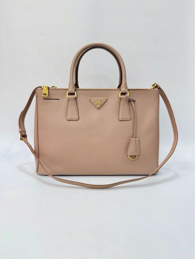 P Saffiano Galleria Medium (Category: Luxury Bags & Wallets) located in Cagayan de Oro. Submitted by beryljane (Listing ID 1401219893, Image 1). Description: Flaws: Corner rubs and cracked inner button. The rest in excellent condition. .