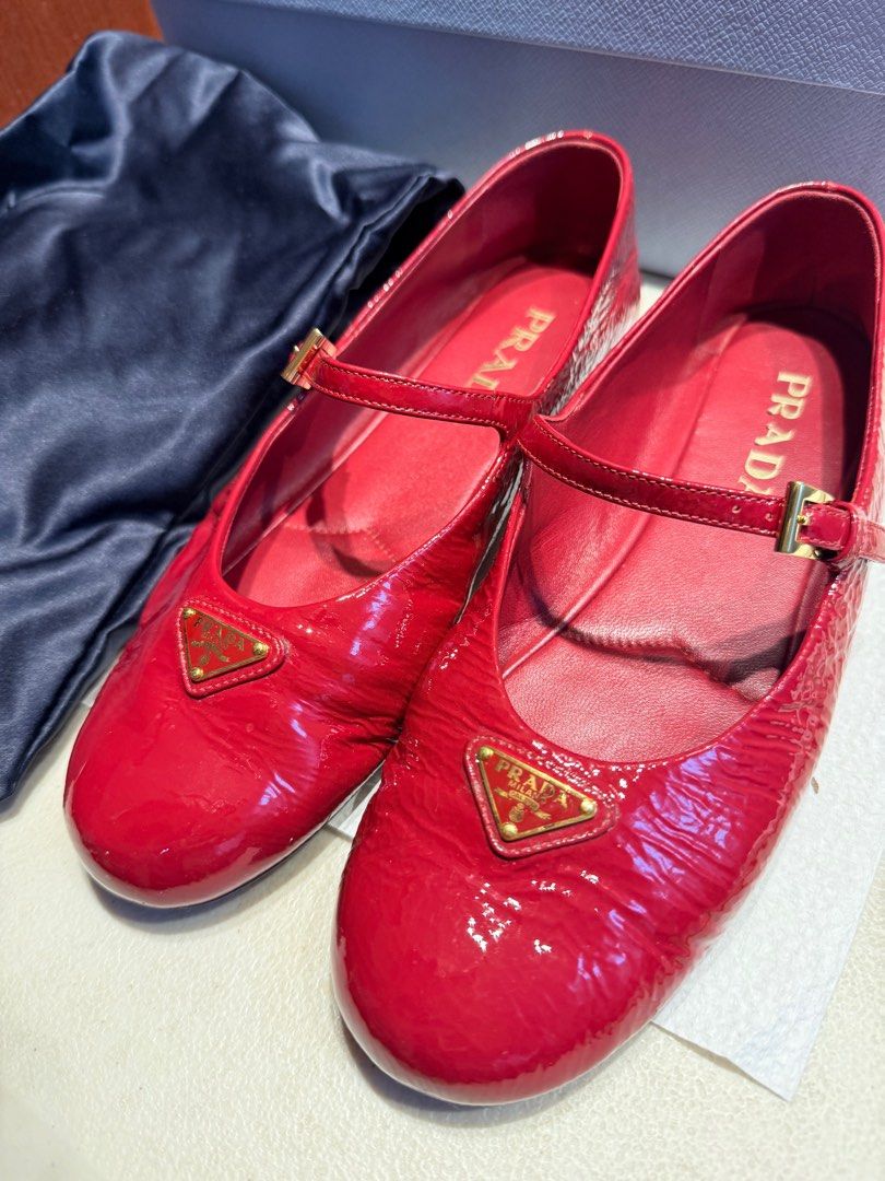 Prada Red Patent Leather Mary Jane Flats (Category: Flats & Sandals) located in Quezon City. Submitted by beabeys (Listing ID 1401265333, Image 2). Description: Authentic Prada Mary Jane flats in red patent leather. Includes the original box,dust bag, and authenticity cards. Bought from florence italy 2024 Barely used .