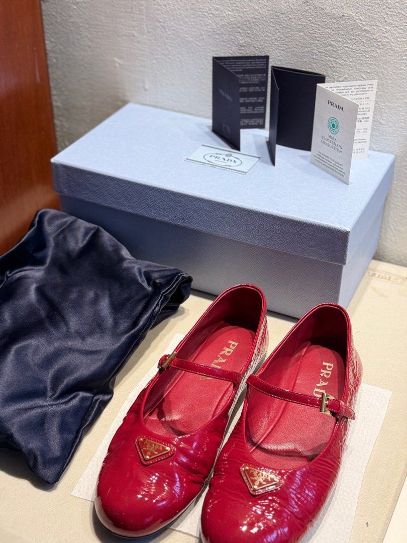 Prada Red Patent Leather Mary Jane Flats (Category: Flats & Sandals) located in Quezon City. Submitted by beabeys (Listing ID 1401265333, Image 3). Description: Authentic Prada Mary Jane flats in red patent leather. Includes the original box,dust bag, and authenticity cards. Bought from florence italy 2024 Barely used .
