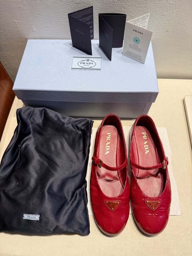 Prada Red Patent Leather Mary Jane Flats (Category: Flats & Sandals) located in Quezon City. Submitted by beabeys (Listing ID 1401265333, Image 1). Description: Authentic Prada Mary Jane flats in red patent leather. Includes the original box,dust bag, and authenticity cards. Bought from florence italy 2024 Barely used .