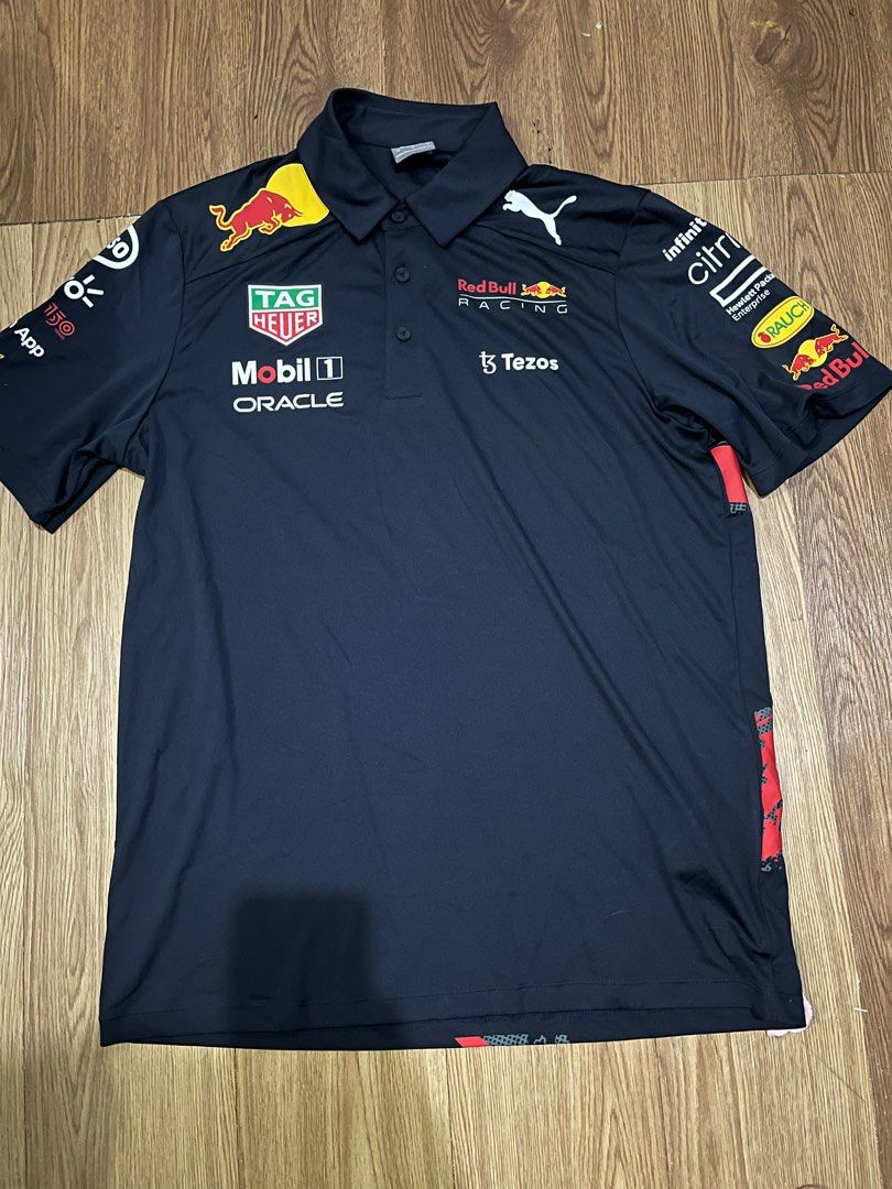 Puma Redbull Racing Polo Shirt Medium (Category: Tshirts & Polo Shirts ) located in Ragay. Submitted by eemensapparel (Listing ID 1401274717, Image 1). Description: Dimensions 28.5 x 20.5 Like new No crack prints Hang tag na lang kulang .