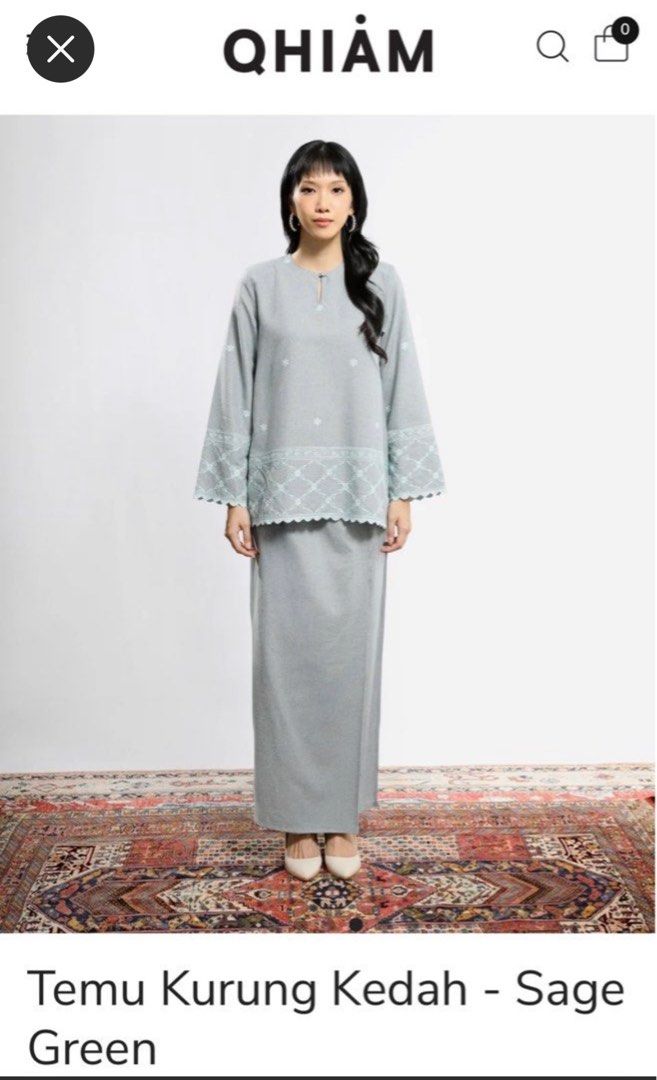 QHIAM Temu Kurung Kedah - Sage Green (Category: Baju Kurung & sets) located in Kuala Lumpur. Submitted by secondlifeobjects (Listing ID 1401195289, Image 1). Description: QHIAM Temu Kurung Kedah in Sage Green. This set includes a top and skirt. The top features a round neckline and long sleeves with embroidered details. The skirt is a straight cut. Size L. Made from a textured fabric. Perfect for a comfortable and stylish look. •Like new, wore tw