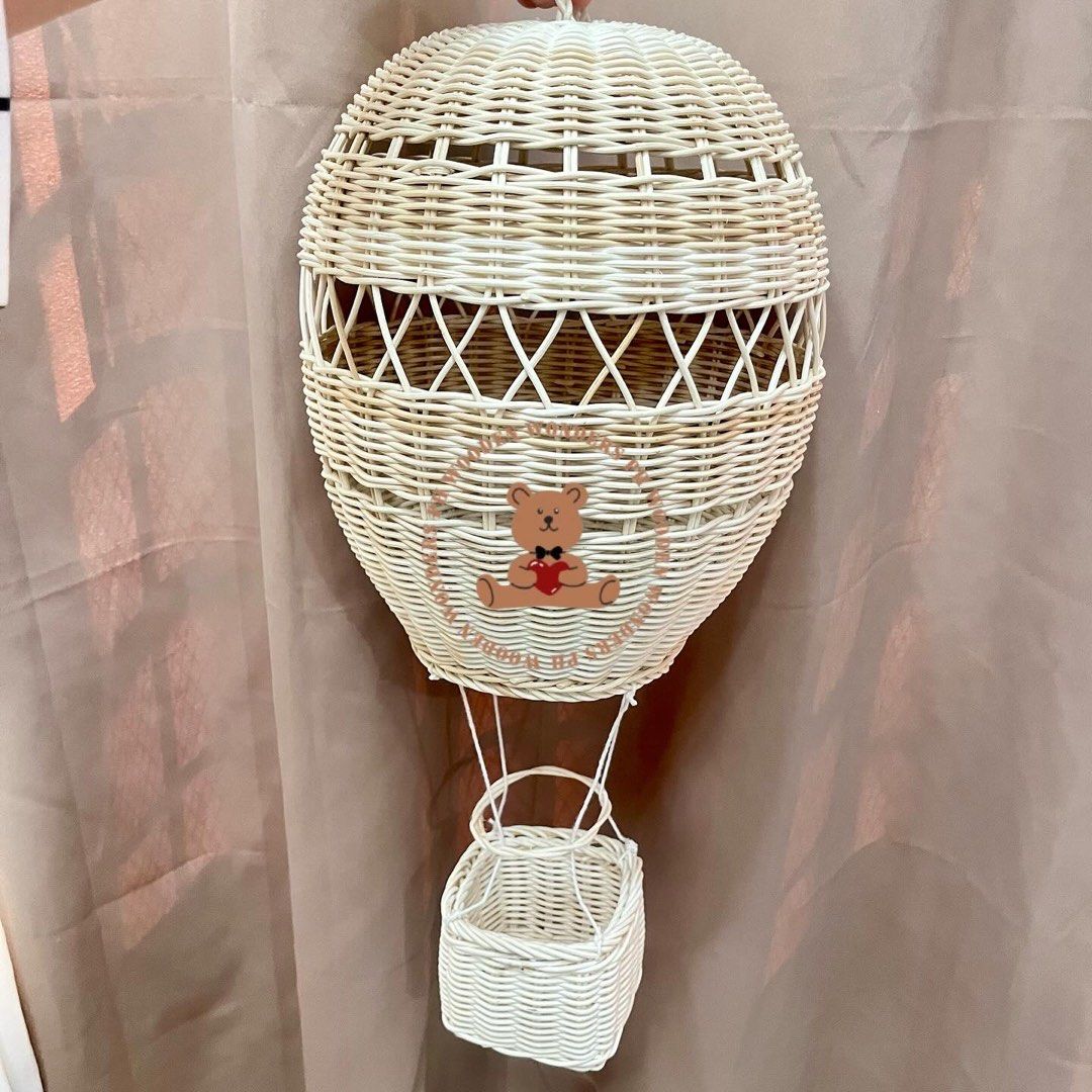 Rattan Hot Air Balloon (Category: Other Home Decor) located in Baguio. Submitted by apihours (Listing ID 1401168898, Image 1). Description: Brand new. Super nice touch to your kids' play room! This looks so similar to Pottery Barn's Hot Air Balloon Mobile. 😍 Balloon Diameter: 10" diameter Basket: 3.5" diameter, 3.25" high Hanging String: 10" long Weight: 2 lbs .