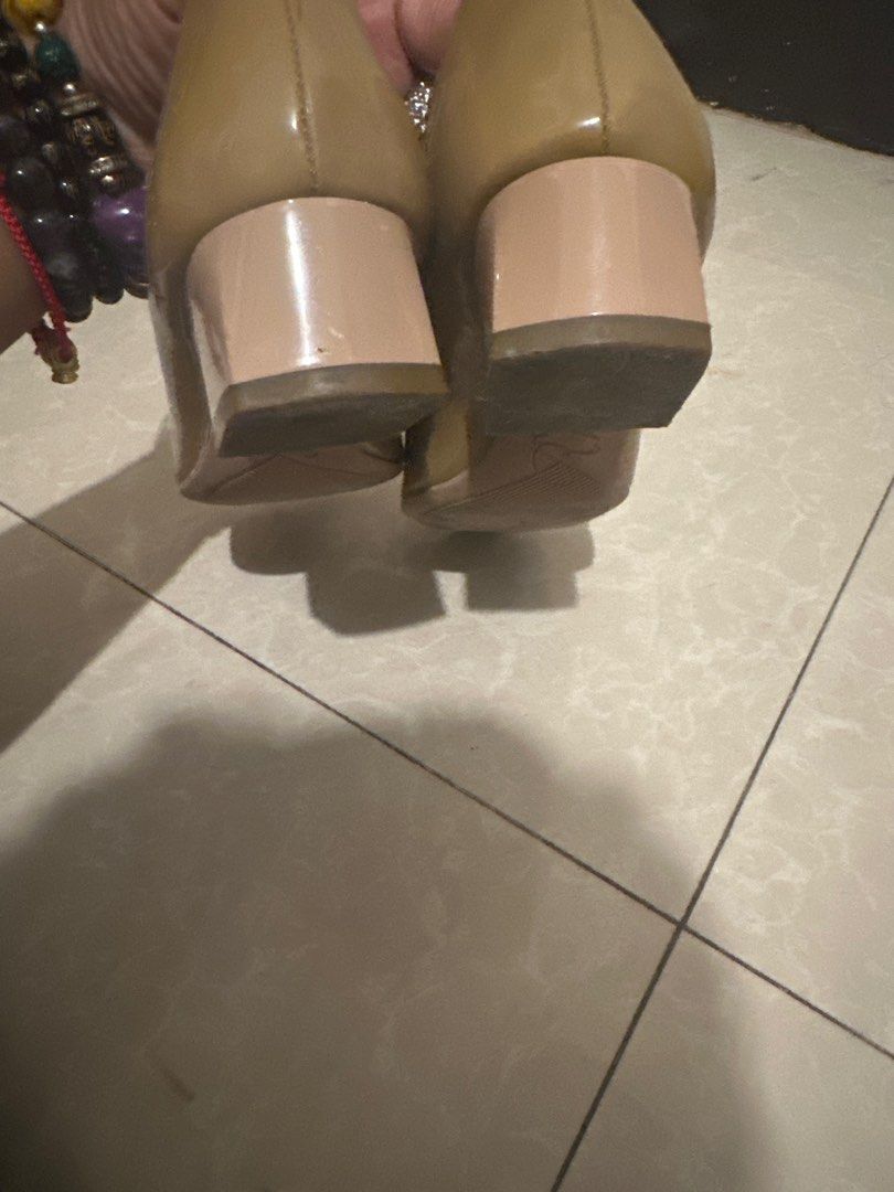 Roger Vivier Buckle Pumps (Category: Sneakers & Footwear) located in Tarlac. Submitted by kishya2024 (Listing ID 1401278653, Image 3). Description: - Roger Vivier pumps in a neutral beige. - Features the iconic square buckle. - Comfortable low heel. - Interior shows wear. - Soles show wear. - A chic addition to your wardrobe..