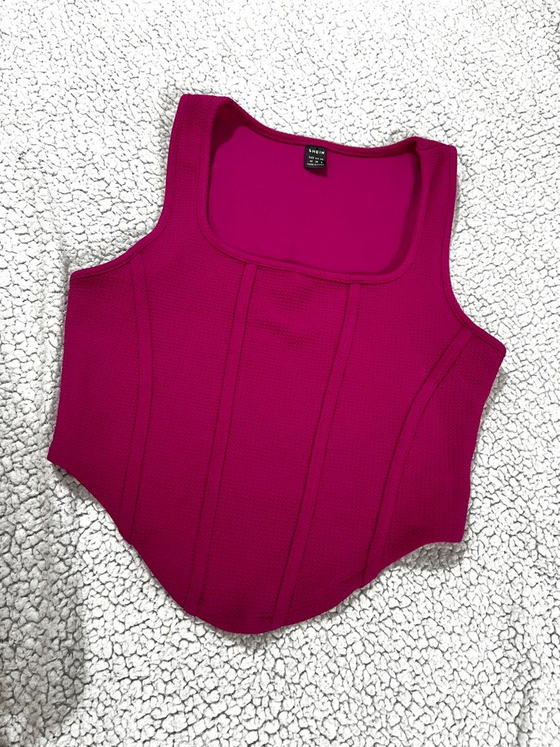 Shein Corset Top - Size M (Category: Others Tops) located in San Fernando. Submitted by declutterbydani__ (Listing ID 1401280174, Image 1). Description: - Shein Magenta Corset Top - Size: M - Features a square neckline - Made with textured fabric - Fitted silhouette with vertical seams - true color is on the last pic 😅.