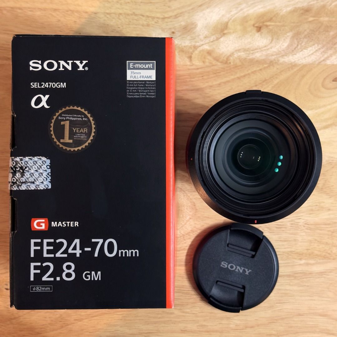 Sony 24-70mm F2.8 GM (Category: Lens & Kits) located in Pasig City. Submitted by mixesmix (Listing ID 1401265813, Image 2). Description: Rarely used. Very clean and in mint condition. In the dry box most of the time. Includes box, Sony lens bag, hood, front and rear caps, and manual.