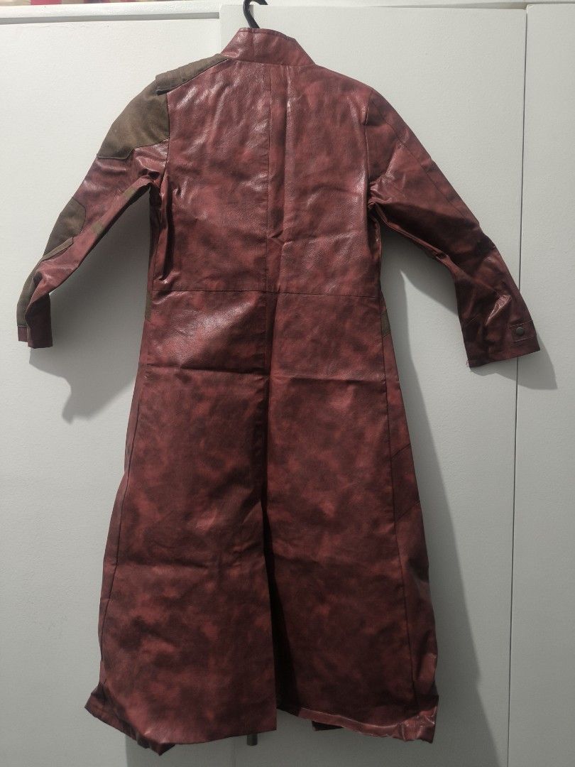 Avengers Marvel StarLord Cosplay Coat (Category: Babies & Kids Fashion) located in Pasig City. Submitted by keibee14 (Listing ID 1401309670, Image 2). Description: - Star-Lord cosplay coat - Red and brown color scheme - Buckle closure - Shoulder accents - Long design - Leather-like material - Detailed front and back design - Unique chest emblem preloved. expect signs of use but pretty decent and the details are very nice and almost real despite t