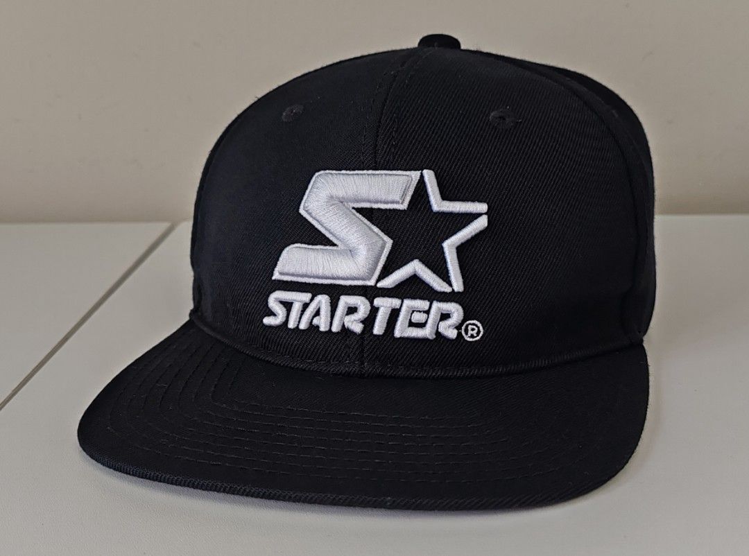 Starter snap back (Category: Cap & Hats) located in Kuala Lumpur. Submitted by eslyy (Listing ID 1401276741, Image 1). Description: - Black Starter cap - White logo - Flat brim - Adjustable snap back - Size: 57-59cm - Like new condition - RM60 .