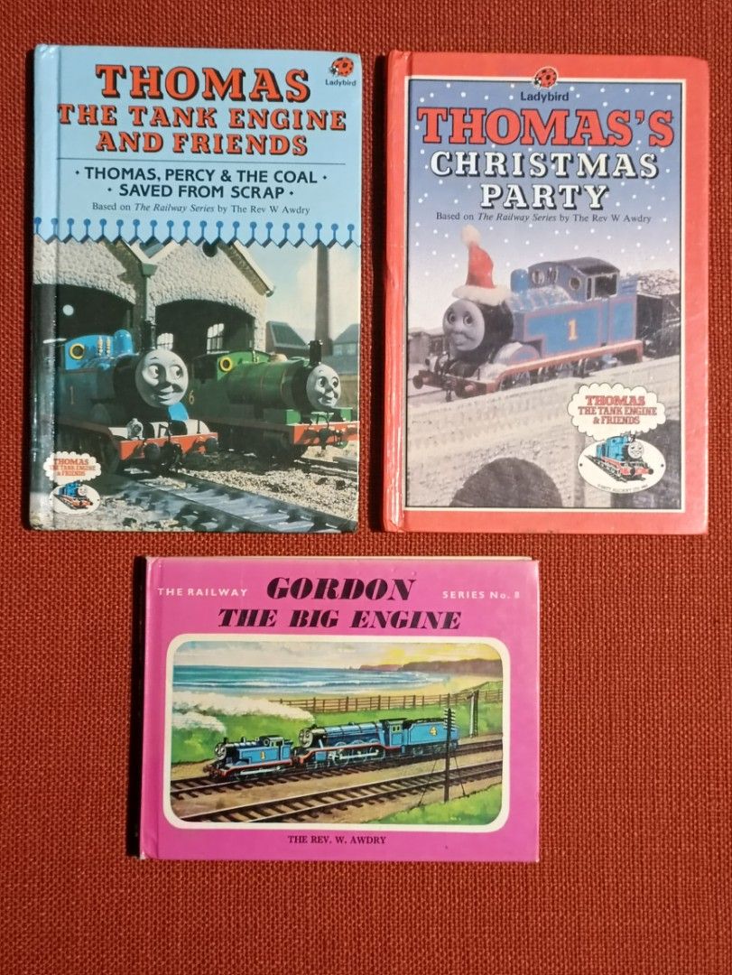 Thomas the Tank Engine Book Bundle (Category: Children's Books) located in Manila. Submitted by krishna_ayanami (Listing ID 1401320817, Image 1). Description: Set of three Thomas the Tank Engine books. Includes "Thomas the Tank Engine & Friends", "Thomas's Christmas Party", and "Gordon the Big Engine". Features colorful illustrations and stories from the popular children's series. Perfect for young readers and Thomas the Tank Engine fans..