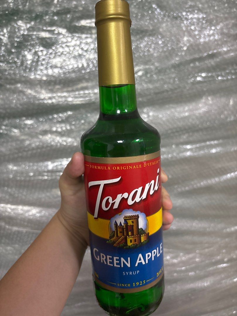 Torani Green Apple Syrup 750ml (Category: Other Food & Drinks) located in Quezon City. Submitted by bernadelle.ong (Listing ID 1401348771, Image 1). Description: - Torani Green Apple Syrup 750ml - Adds green apple flavor - Great for drinks - Expiry Date: July 15, 2027.