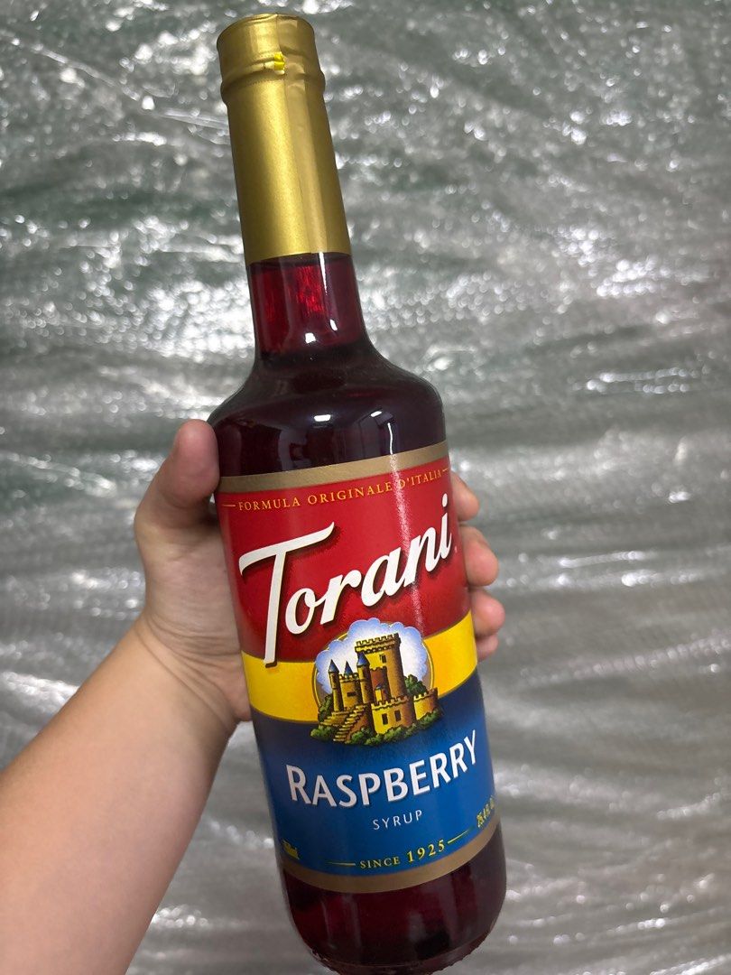 Torani Raspberry Syrup 750ml (Category: Other Food & Drinks) located in Quezon City. Submitted by bernadelle.ong (Listing ID 1401348892, Image 1). Description: - Torani Raspberry Syrup 750ml - Adds raspberry flavor - Great for coffee, cocktails, and more - Best Before: February 1, 2027.