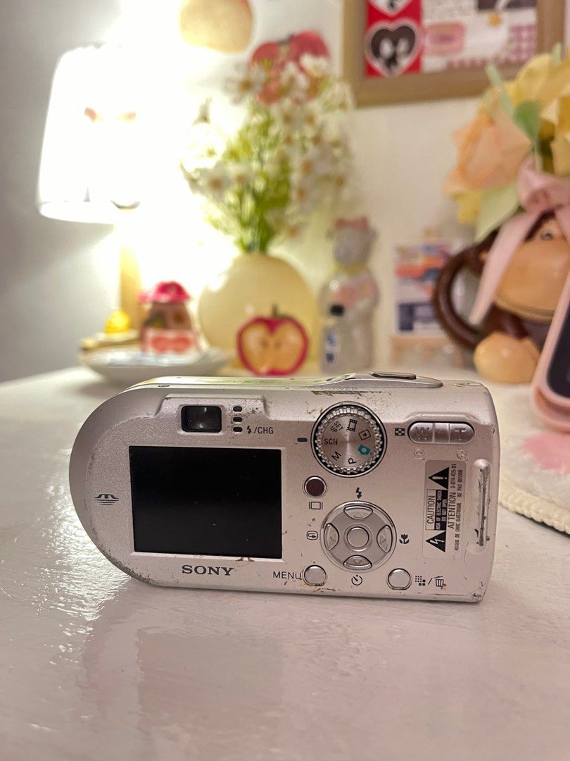 UNTESTED Sony Cyber-shot 7.2MP Digital Camera (Category: Cameras) located in Manila. Submitted by revdeclutter (Listing ID 1401280351, Image 2). Description: - Sony Cyber-shot digital camera - 7.2 Megapixels - Carl Zeiss lens - Silver finish - Built-in flash - Display screen - Zoom lens - Compact and portable - Features function buttons.