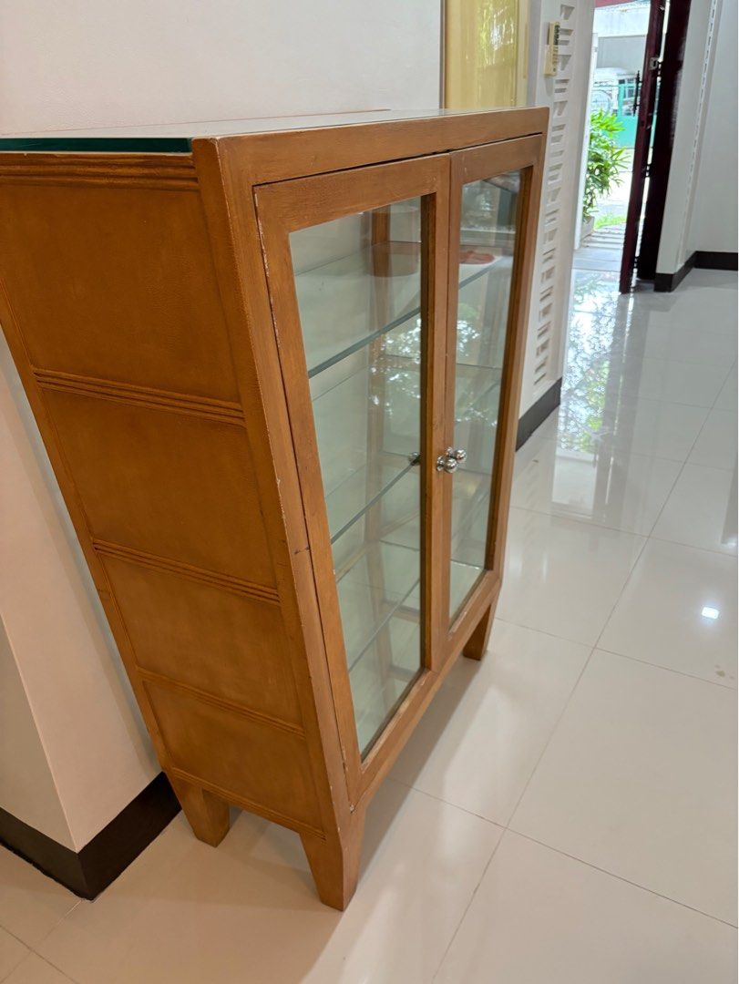 Used High Quality Display Cabinet (Trapezoidal) (Category: Shelves, Cabinets & Racks) located in Paranaque City. Submitted by turnintocash (Listing ID 1401237553, Image 3). Description: good condition pls see dimension in photos thick glass shelves solid wood frame pick up location - Paranaque .