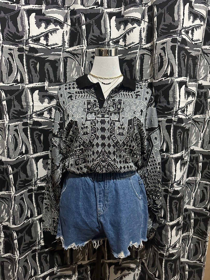 Vintage Patterned Polo Sweater (Category: Coats, Jackets and Outerwear) located in Antipolo. Submitted by declutteringsizzy (Listing ID 1401293790, Image 1). Description: - Vintage sweater - Geometric gray and black pattern - Classic polo collar - Long sleeves with ribbed cuffs - Relaxed fit - Ribbed hem - Perfect for a retro look - Width = 23in” - Length = 26in”.