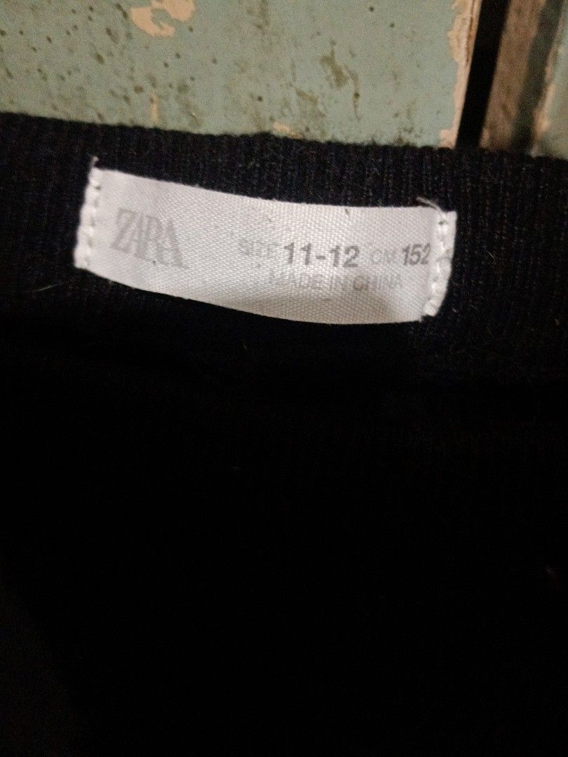 Zara Black Ribbed Pants Size 11-12 (Category: Other Bottoms) located in San Juan City. Submitted by vrncrosetejk (Listing ID 1401225991, Image 2). Description: - Zara black ribbed pants - Wide, off-the-shoulder design - Size 11-12 - Made in China - Knit fabric - Solid black color.
