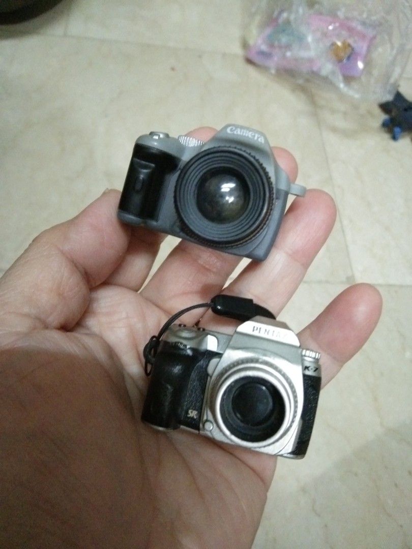 2 pcs realistic camera toys (Category: Cameras) located in Quezon City. Submitted by eidorableshop (Listing ID 1401490361, Image 1). Description: .