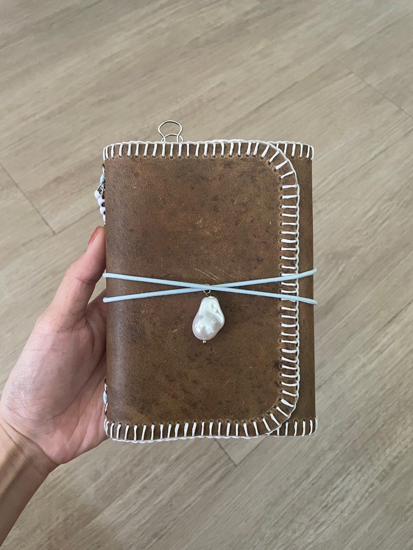 A6 Leather Tri-fold Journal Folio (Category: Stationery & School Supplies) located in Cainta. Submitted by aroserod (Listing ID 1401357384, Image 1). Description: Handcrafted Louise Carmen | Paper Republic Inspired Leather Tri-fold Journal With free inserts/notebook. Can customize other colors, charms, size #journal #journaling #louisecarmen #paperrepublic .