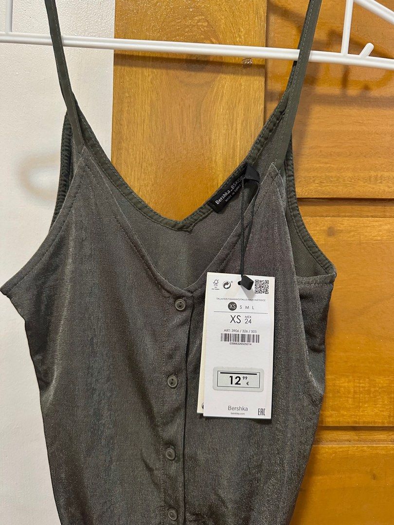 Bershka Tie Top (Category: Sleeveless) located in Dasmarinas. Submitted by mnqstuff (Listing ID 1401462710, Image 1). Description: BNWT.
