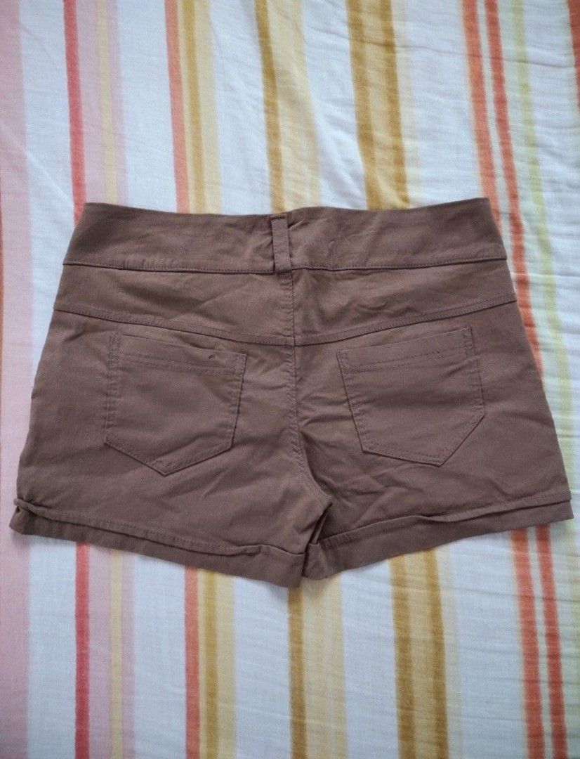 Brown Shorts (Category: Shorts) located in Manila. Submitted by maze.declutter (Listing ID 1401401697, Image 2). Description: -brown shorts -solid color -stretchable -can fit 30-32.