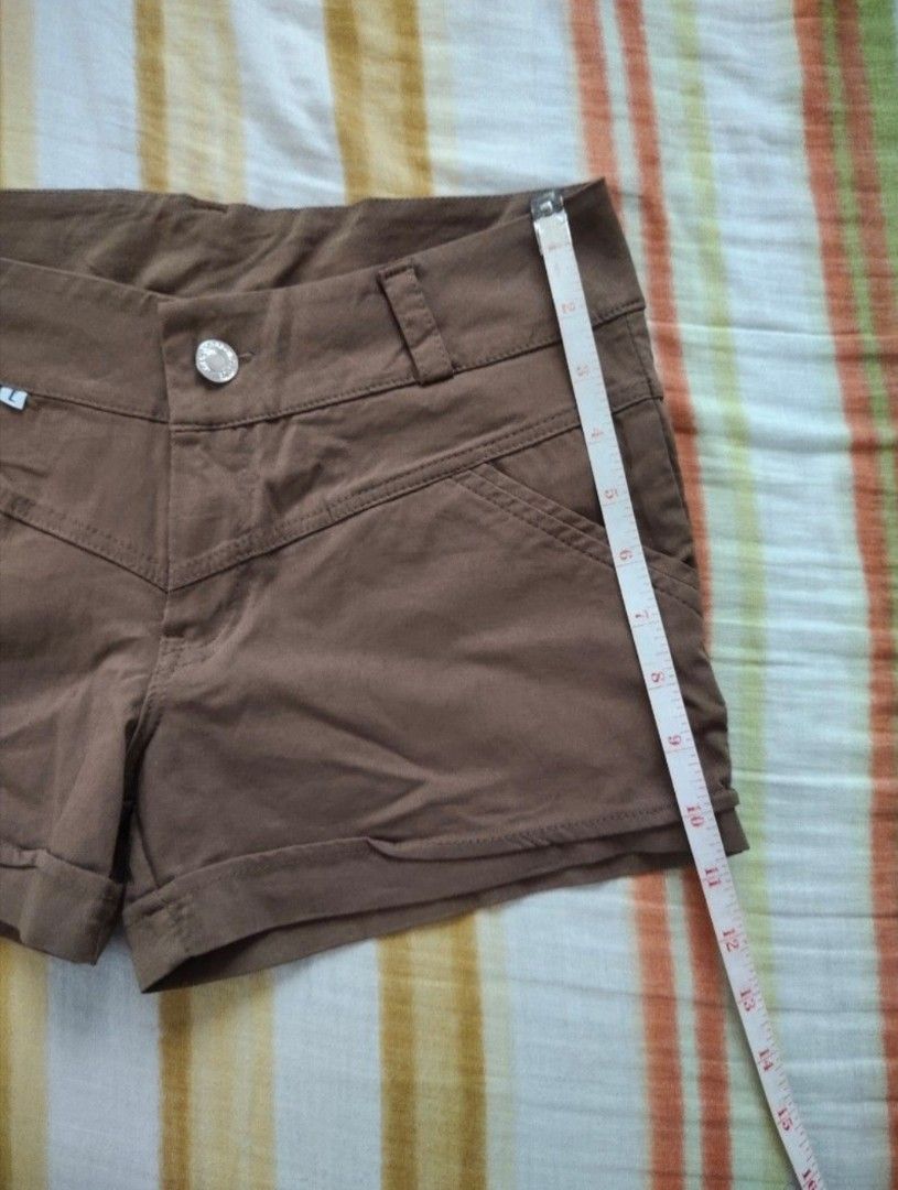 Brown Shorts (Category: Shorts) located in Manila. Submitted by maze.declutter (Listing ID 1401401697, Image 3). Description: -brown shorts -solid color -stretchable -can fit 30-32.