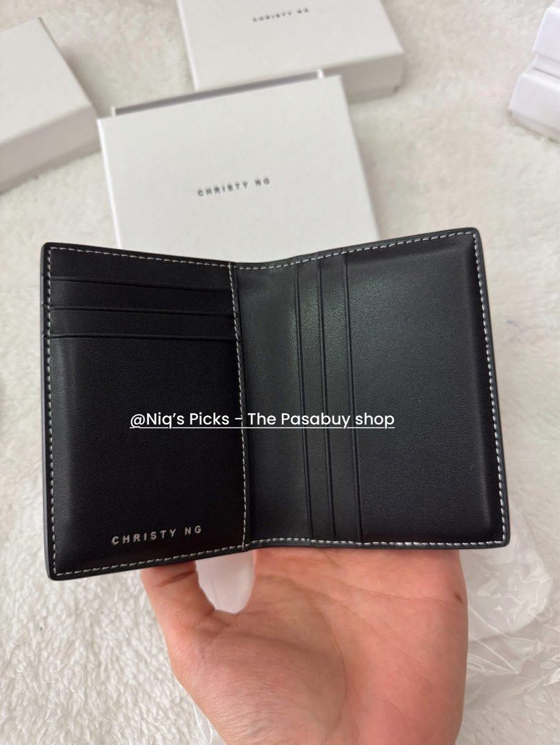Christy Ng Rossi Bifold Wallet (Category: Wallets & Card holders) located in Mandaluyong City. Submitted by syzj30 (Listing ID 1401405803, Image 3). Description: Christy Ng Rossi Bifold Cardholder Colors: • Black • Chestnut Brown • Burgundy • Ash Details: • Vegan leather • Bifold construction • 7 card slots & 1 pocket • Size: 3.1” (L) x 4.4” (H) 👉🏻 Comes with a box, dust bag, and paper bag 📍Mandaluyong City.