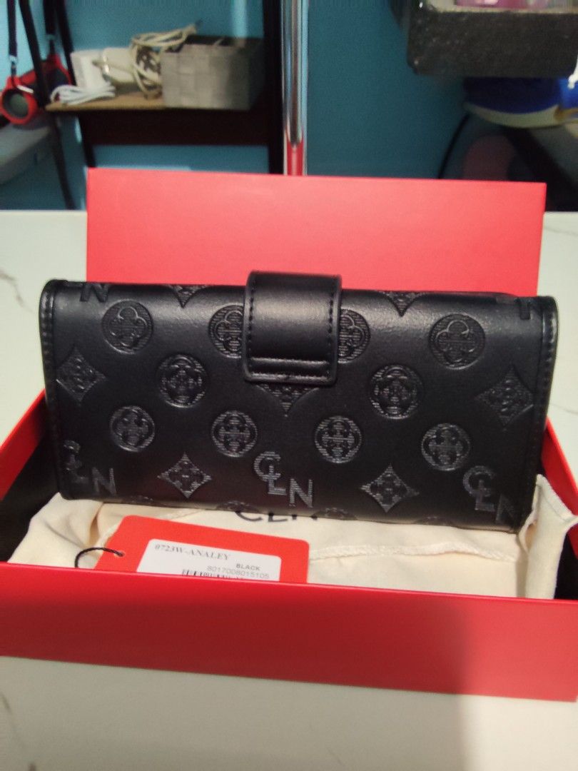 CLN Black Wallet (Category: Wallets & Card holders) located in Pasig City. Submitted by zealfish.3d4f32 (Listing ID 1401454473, Image 2). Description: CLN long wallet brand-new complete with tag, dust bag and box.