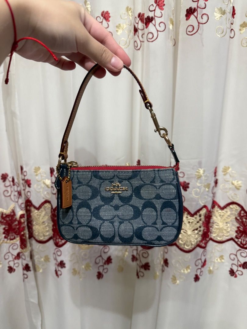 Coach Denim Nolita 15 (Category: Purses & Pouches) located in Cabuyao City. Submitted by safe.rachesells (Listing ID 1401420449, Image 1). Description: ☁️ super nice condition ☁️ used a few times ☁️ super cute!!! ☁️ lalamove shipping RFS: decluttering .